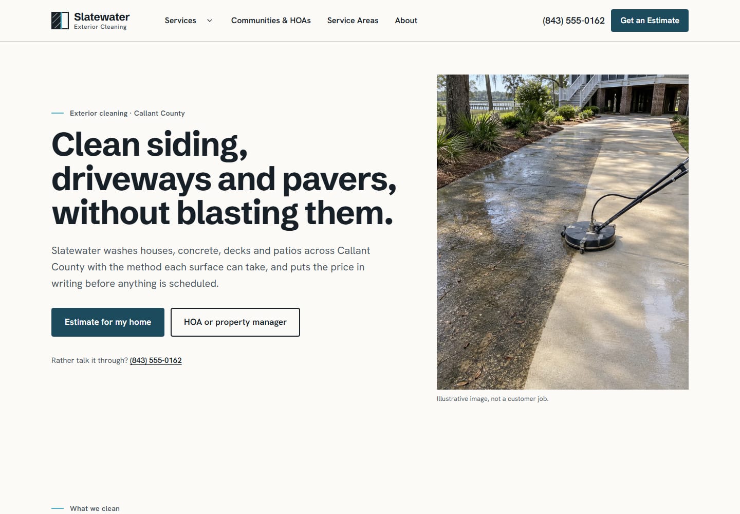 Slatewater homepage with the headline Clean siding, driveways and pavers, without blasting them., a dark teal Estimate for my home button beside an outlined HOA or property manager button, a quieter phone link underneath, and a photograph of a rotary surface cleaner part-way along a driveway captioned Illustrative image, not a customer job.